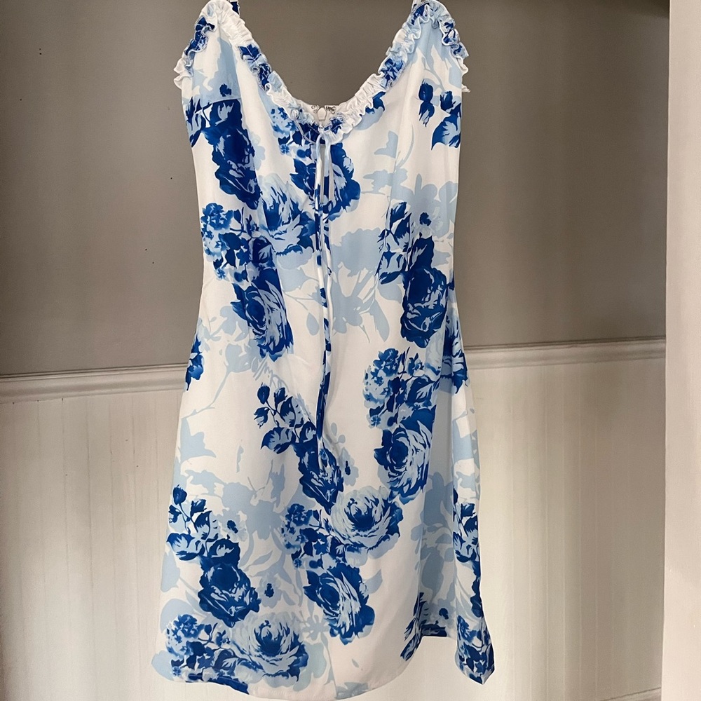 Brand new with tags white fox dress! Blue and white floral XS